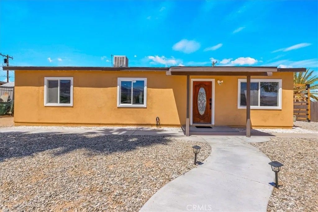 Photo of 74076 Casita Dr, 29 Palms, CA 92277 (MLS # JT26089598)