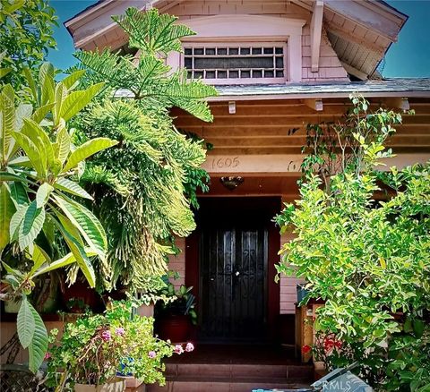 Photo of 1605 W 35th, Los Angeles, CA 90018 (MLS # IV25275979)