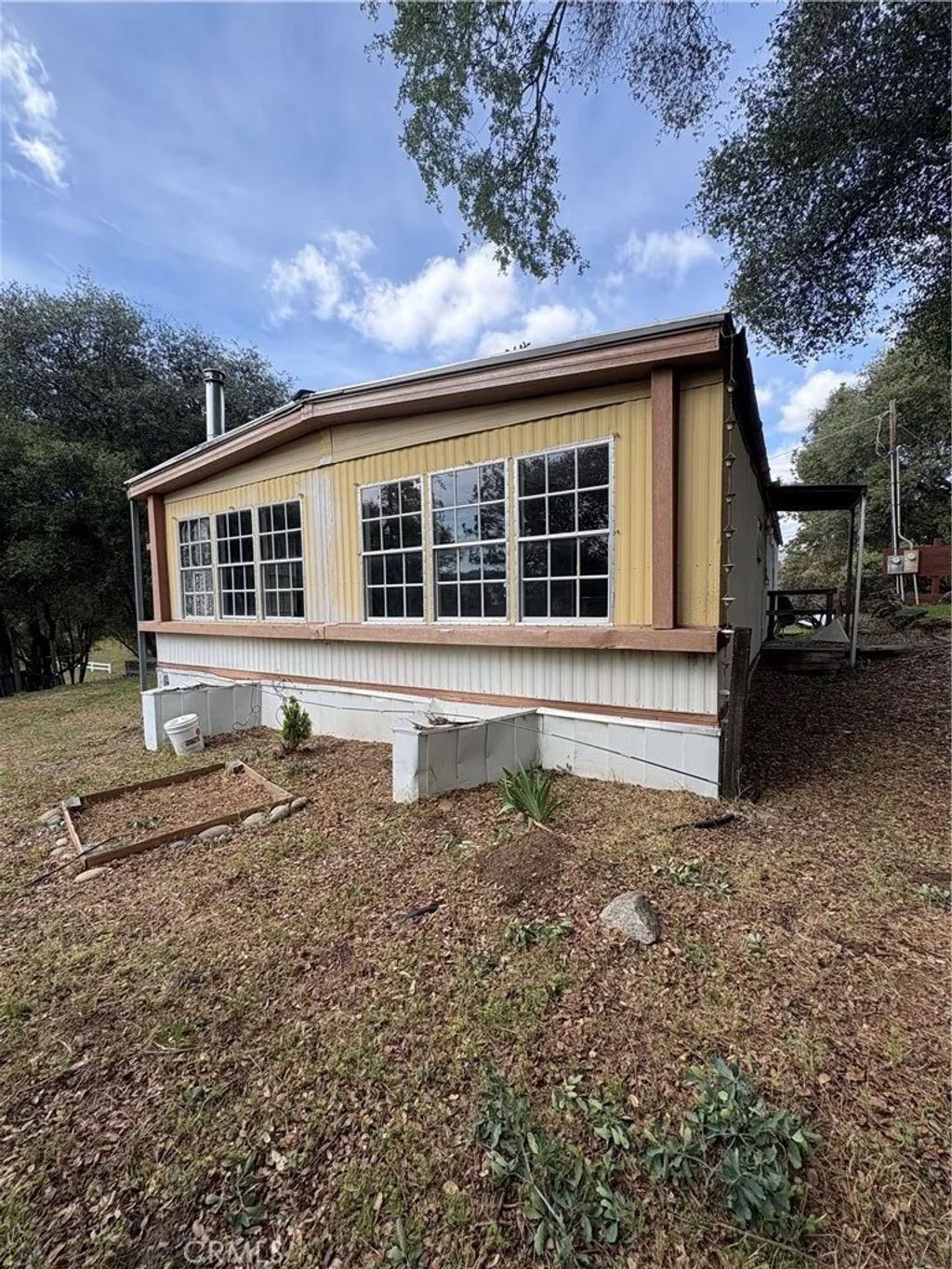 Photo of 38833 Terri Lane, Oakhurst, CA 93644 (MLS # MP26076910)