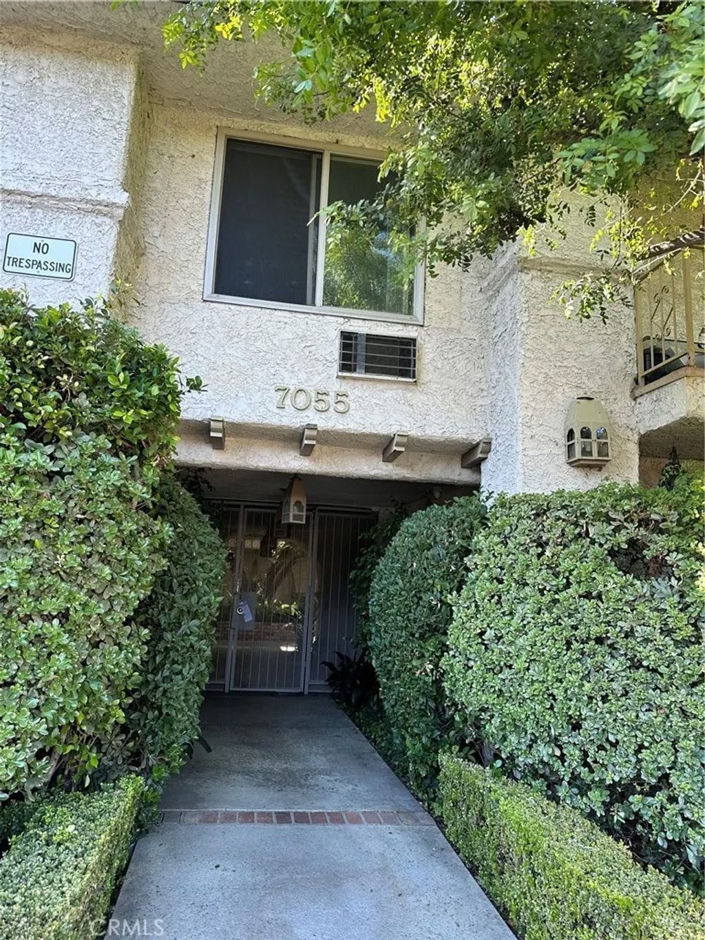 Photo of 7055 Etiwanda Avenue #210, Reseda, CA 91335 (MLS # SR26000872)
