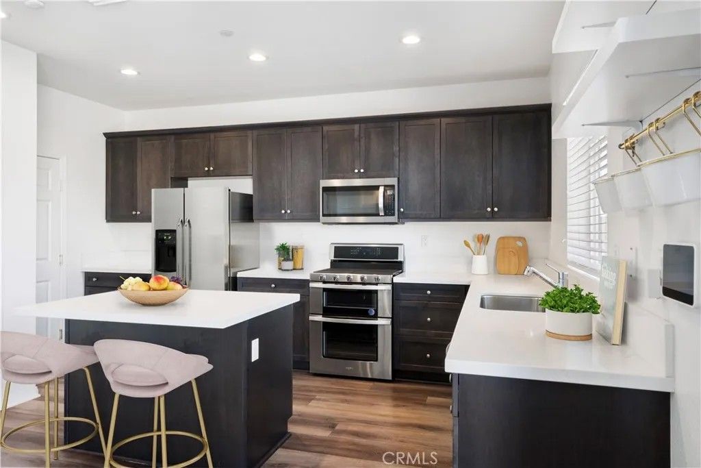 Photo of 9605 Bonsai Lane, Riverside, CA 92508 (MLS # IG26043707)