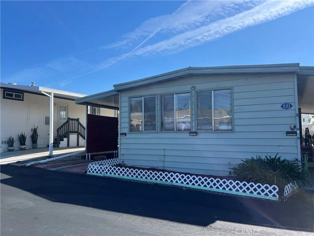 Photo of 718 Sycamore Ave #21, Vista, CA 92083 (MLS # ND26066927)