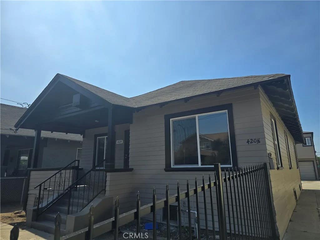 Photo of 420 W 53rd ST, Los Angeles, CA 90037 (MLS # DW26164374)
