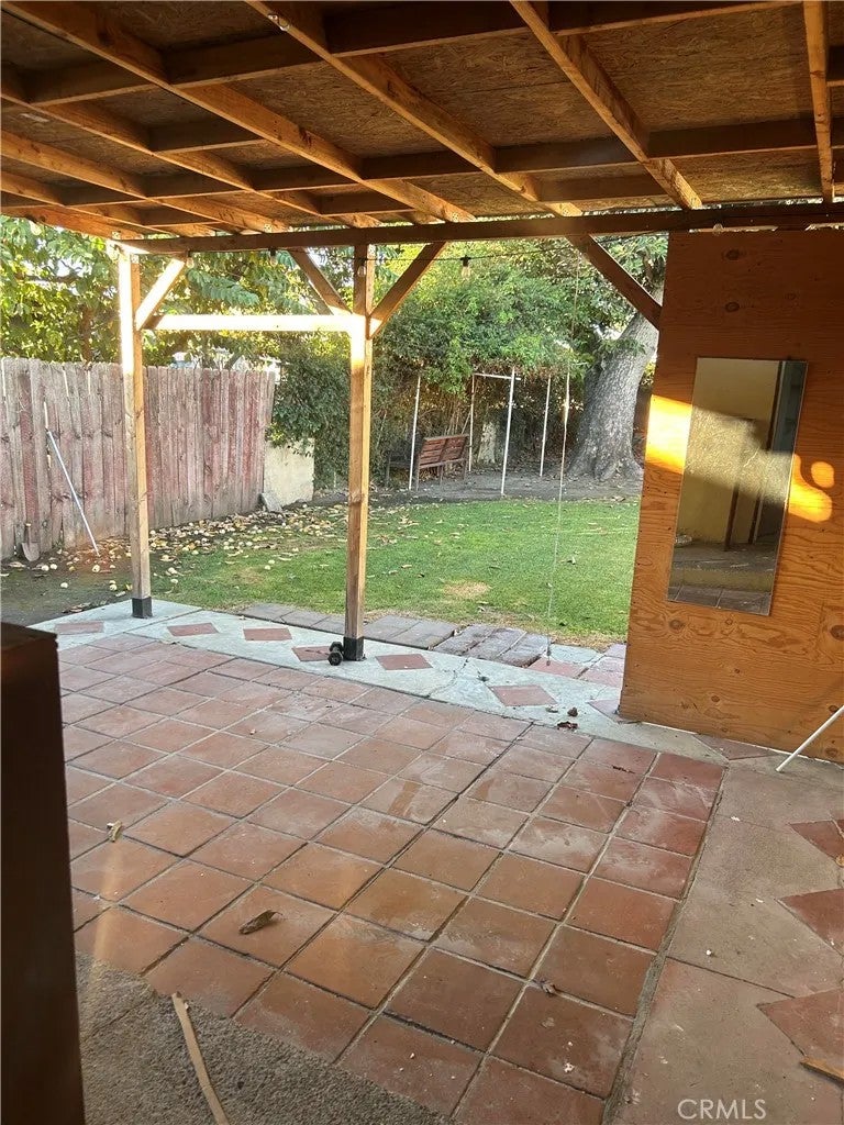 Photo of 13121 S Penrose AVE, Compton, CA 90222 (MLS # PV26230403)