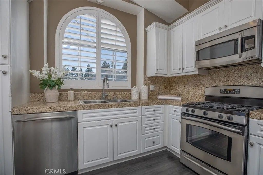 Photo of 23412 Pacific Park Drive, Unit 27A Dr, Aliso Viejo, CA 92656 (MLS # OC26059401)