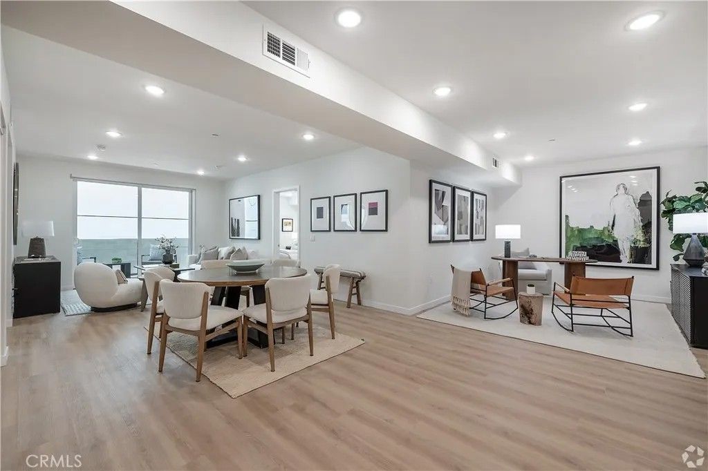 Photo of 1303 S Orange Grove Avenue #603, Los Angeles, CA 90019 (MLS # SB26082958)