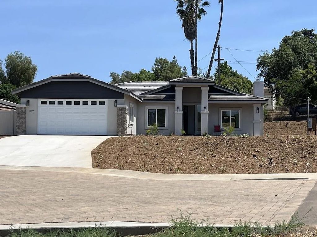 Photo of 11977 Raceway Ln, Lakeside, CA 92040 (MLS # 250041923)