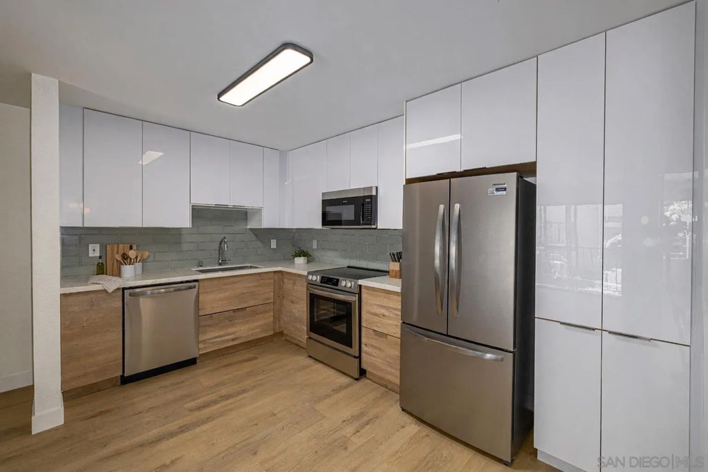 Photo of 3020 Cowley Way #104, San Diego, CA 92117 (MLS # 260018674)