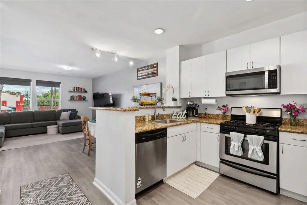 Photo of 1801 E Katella Ave #2157, Anaheim, CA 92805 (MLS # PW26069916)