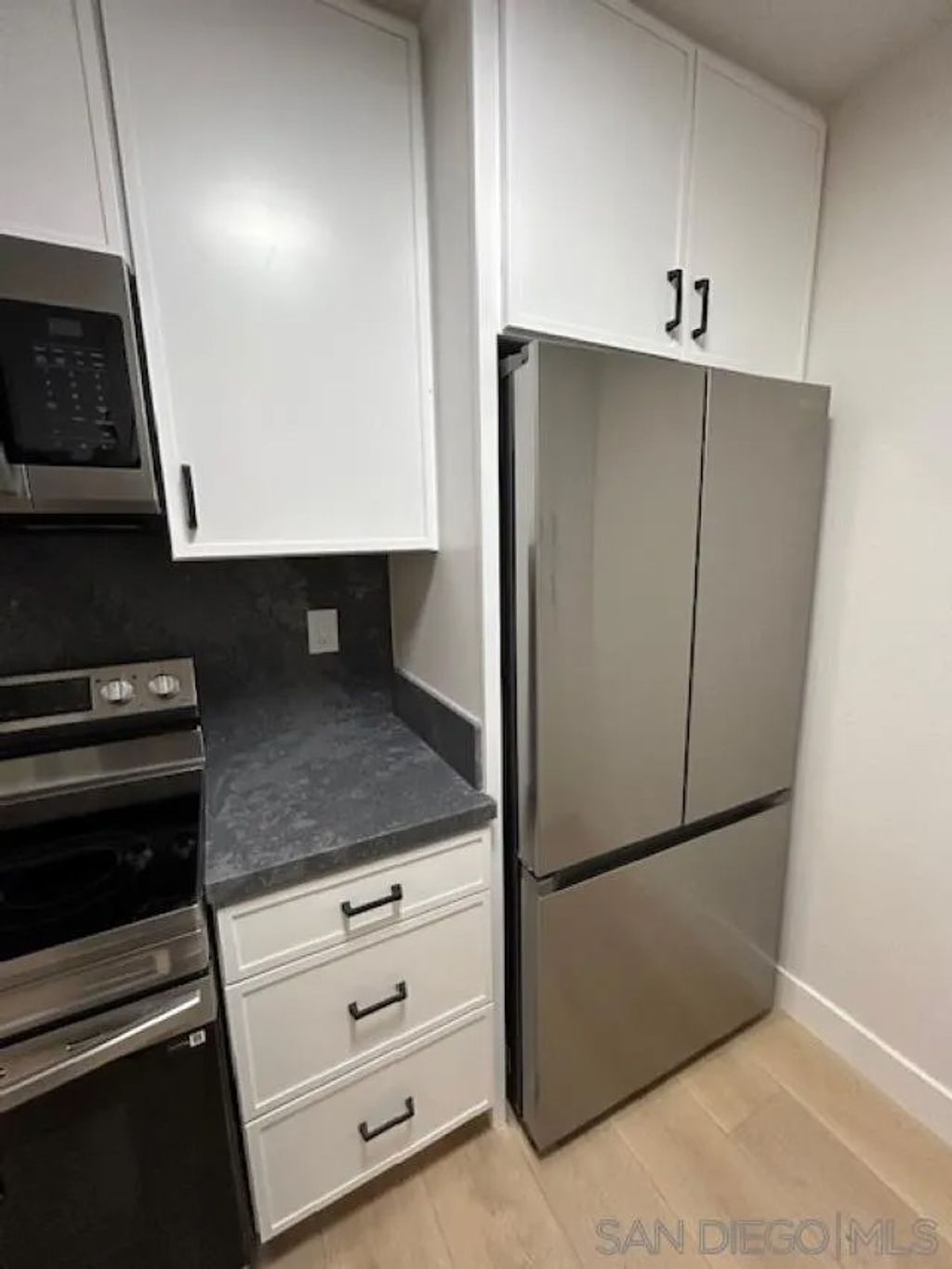 Photo of 811 W Nutmeg St #102, San Diego, CA 92103 (MLS # 260010425)