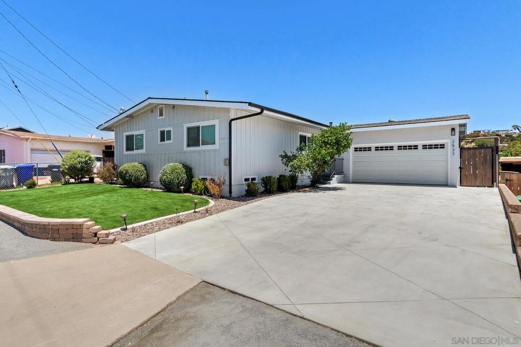 Photo of 2533 Calle Tres Lomas, San Diego, CA 92139 (MLS # 260015230)