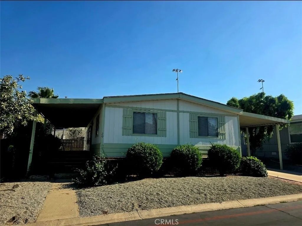 Photo of 1550 Rimpau Ave #20, Corona, CA 92881 (MLS # IG25162625)