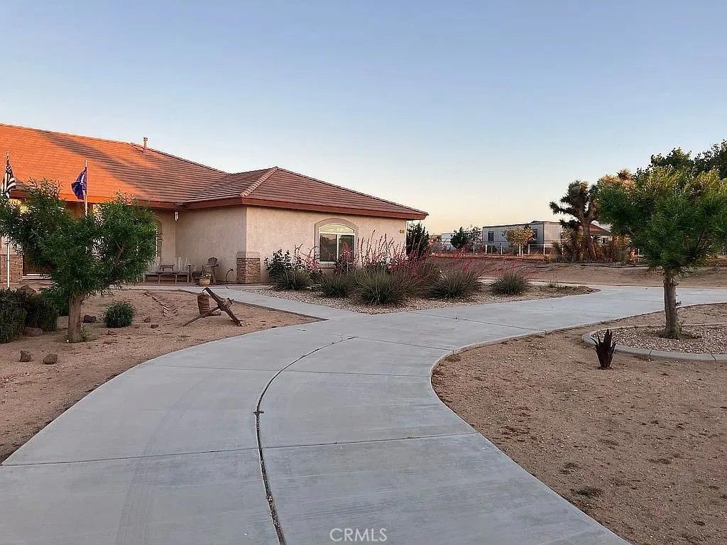 Photo of 6581 Bartlett Dr, Phelan, CA 92371 (MLS # OC26004912)