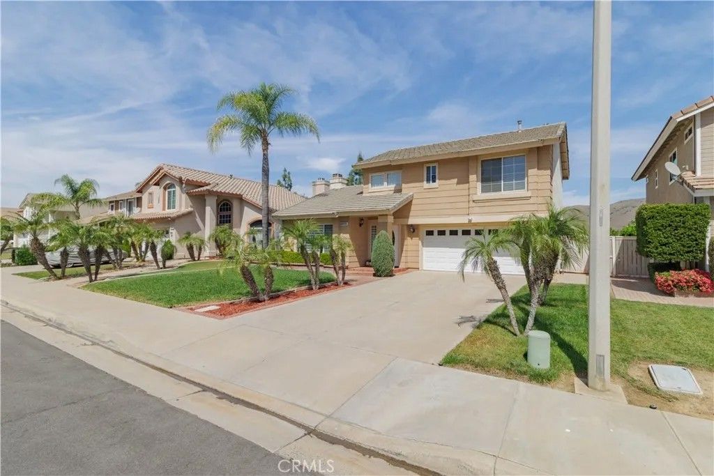 Photo of 13390 Cloudburst Drive, Corona, CA 92883 (MLS # IG26057721)
