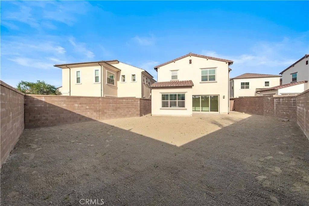 Photo of 128 Rimstone, Irvine, CA 92618 (MLS # OC25275856)