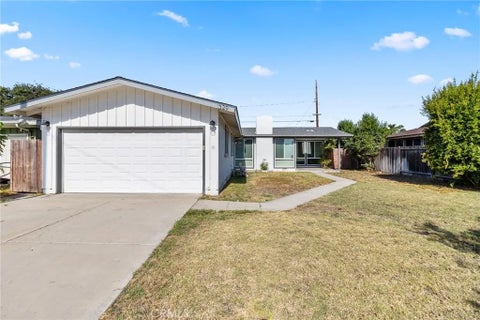 Photo of 1329 N Maple Street, Anaheim, CA 92801 (MLS # OC26205524)