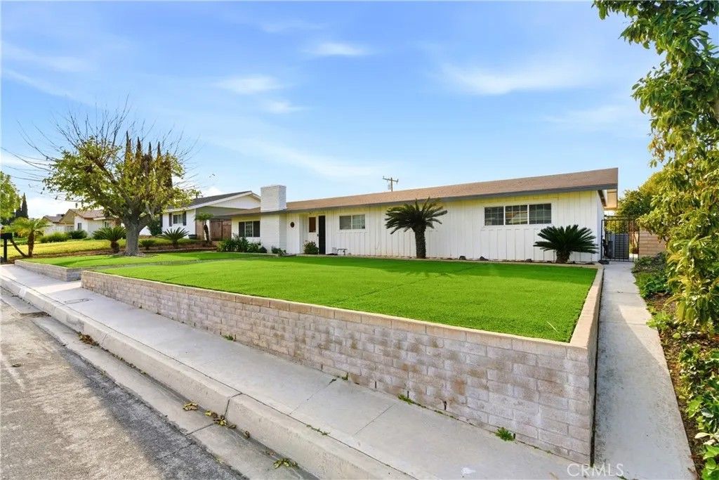 Photo of 11786 Holly St, Grand Terrace, CA 92313 (MLS # IV26044171)