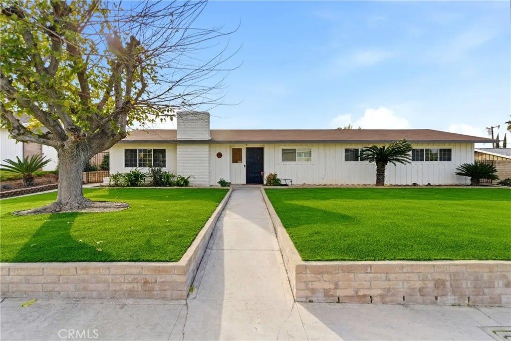 Photo of 11786 Holly St, Grand Terrace, CA 92313 (MLS # IV26044171)