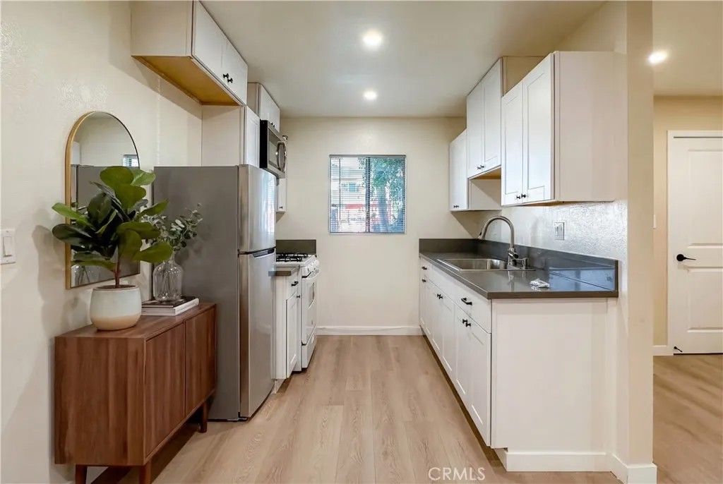 Photo of 6911 Ben Ave #1, North Hollywood, CA 91605 (MLS # BB26056807)