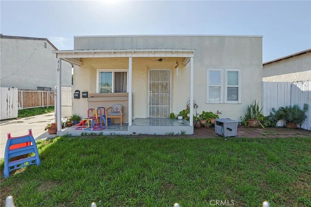 Photo of 410 E 60th St, Long Beach, CA 90805 (MLS # PW26028551)