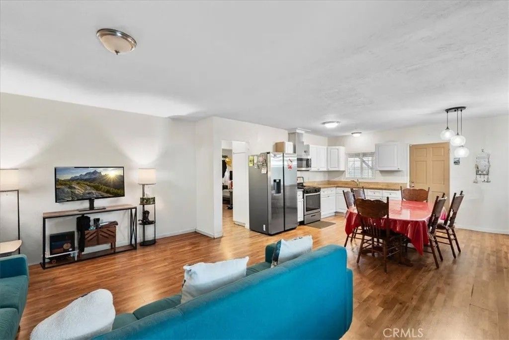 Photo of 1035 Laurel Avenue, Pomona, CA 91768 (MLS # CV25276713)