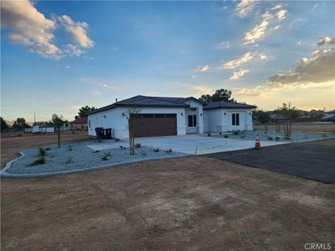 Photo of 20530 OTOE Road, Apple Valley, CA 92307 (MLS # HD26213371)