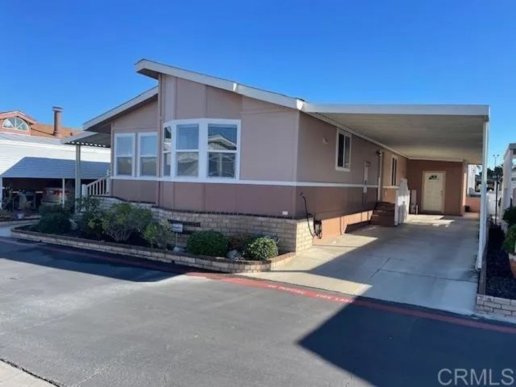 Photo of 9850 Garfield Ave #113, Huntington Beach, CA 92646 (MLS # NDP2603207)