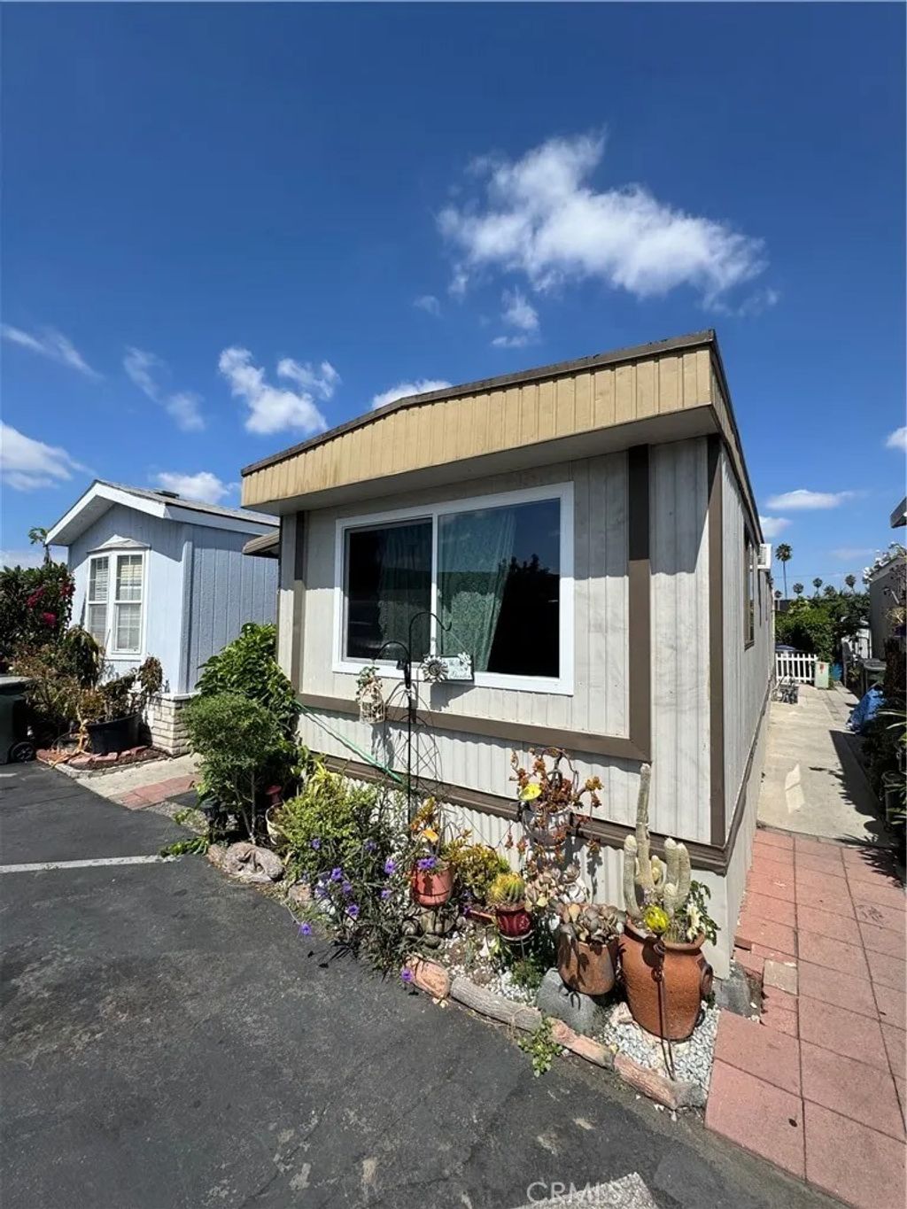 Photo of 100 W Midway Mnr #115, Anaheim, CA 92805 (MLS # PW26066086)