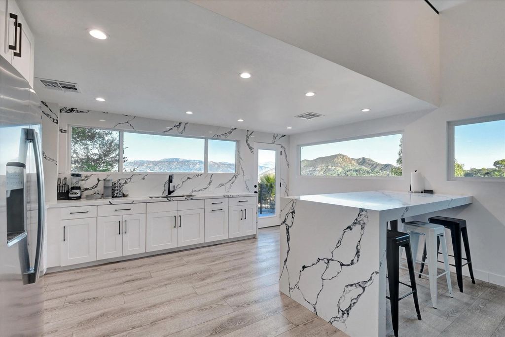 Photo of 3546 Multiview Drive, Los Angeles, CA 90068 (MLS # 250044947)