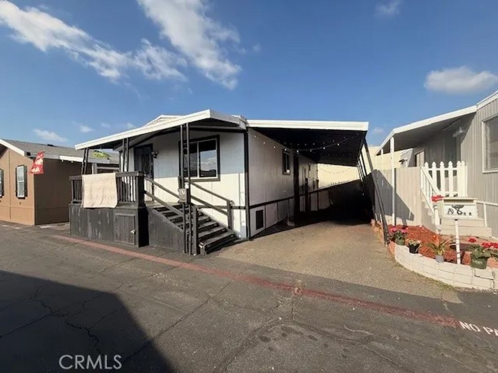 Photo of 716 N Grand Ave #A7, Covina, CA 91724 (MLS # DW26020210)