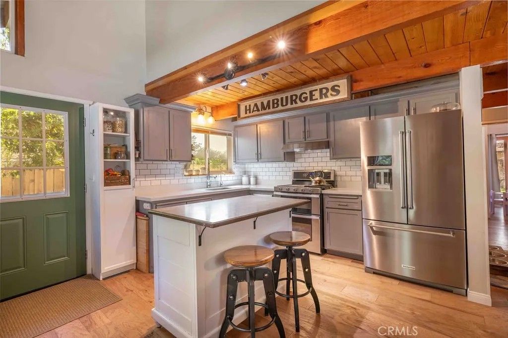 Photo of 945 Tinker Bell Avenue, Big Bear Lake, CA 92314 (MLS # PW25272212)