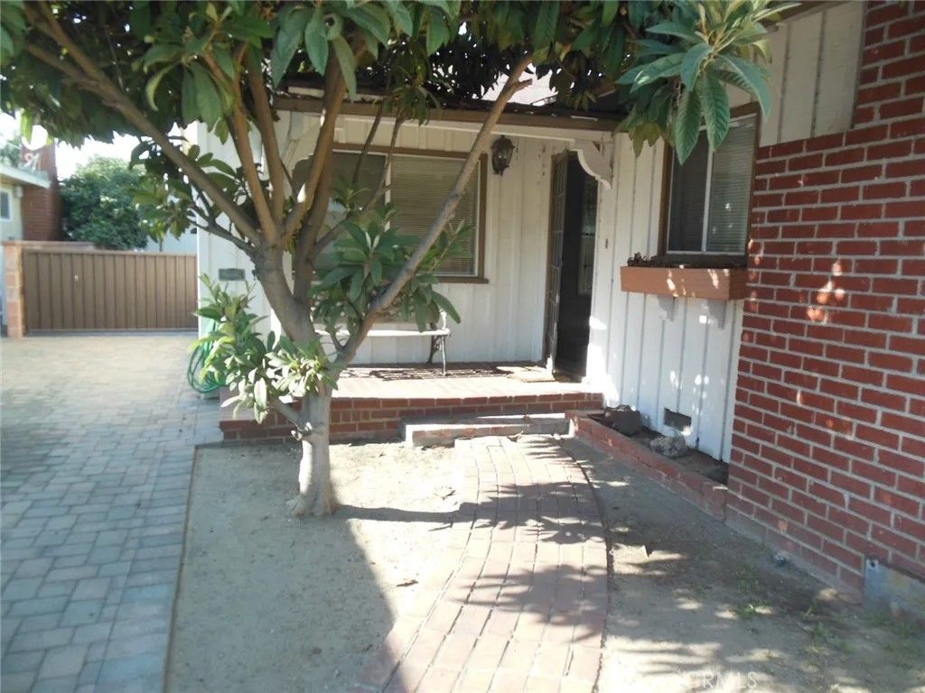 Photo of 9933 Tristan Dr, Downey, CA 90240 (MLS # PW26028806)