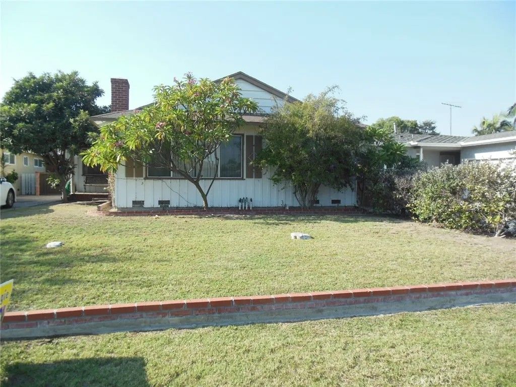 Photo of 9933 Tristan Dr, Downey, CA 90240 (MLS # PW26028806)