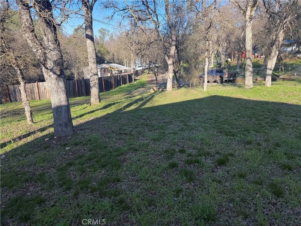 Photo of 15545 Pine Ave, Clearlake, CA 95422 (MLS # LC26006671)