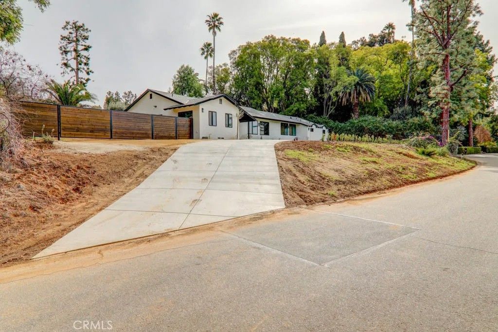 Photo of 6174 Hawarden Dr, Riverside, CA 92506 (MLS # IV26019897)