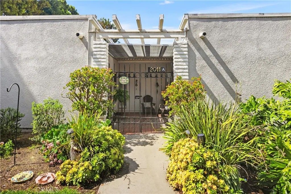 Photo of 2011 Via Mariposa West #A, Laguna Woods, CA 92637 (MLS # LG26059880)