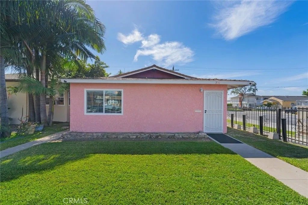 Photo of 706 E Palmer St, Compton, CA 90221 (MLS # MB26049740)