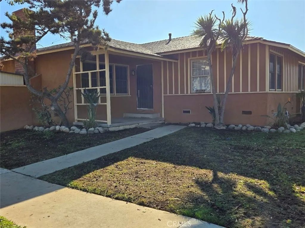 Photo of 12912 S Saint Andrews, Gardena, CA 90249 (MLS # IN26031003)