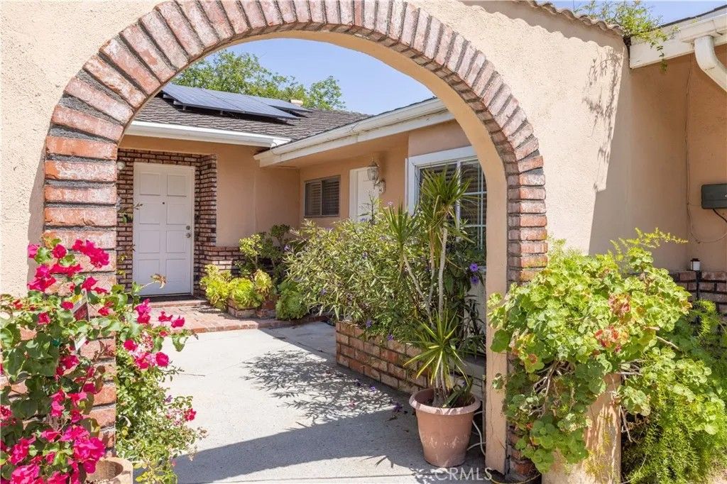 Photo of 10410 Amigo Avenue #A, Porter Ranch, CA 91326 (MLS # SR26078674)