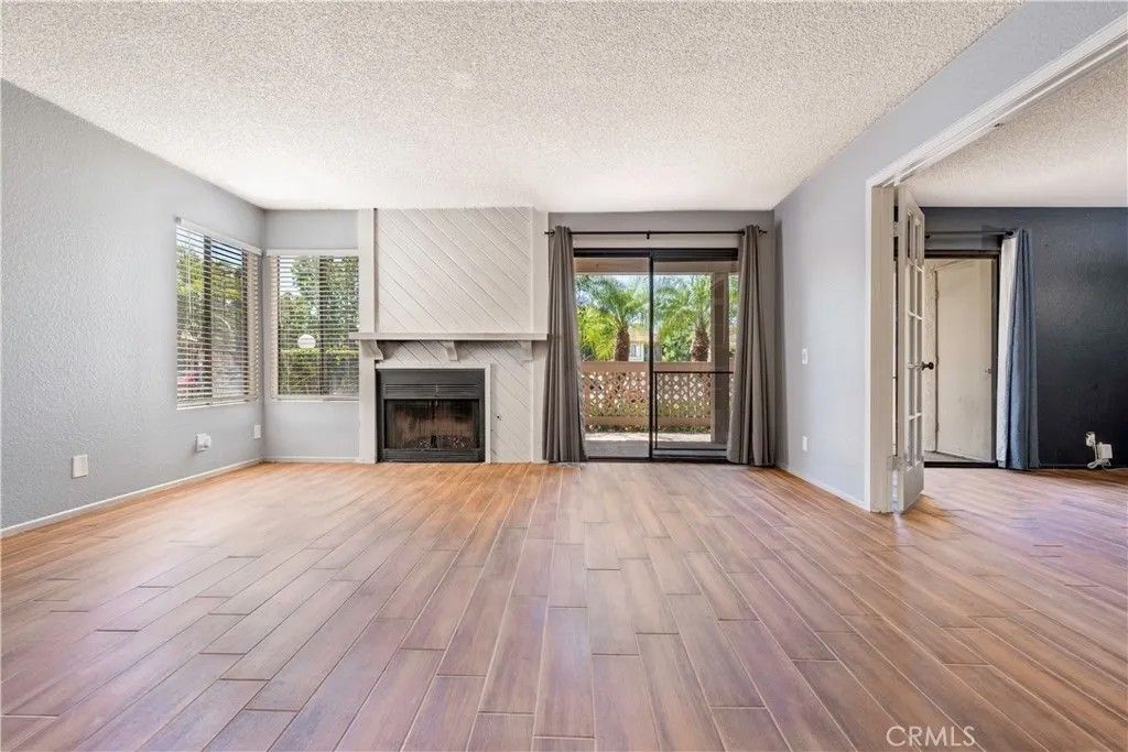 Photo of 16581 Grunion Ln #107, Huntington Beach, CA 92649 (MLS # OC26092066)