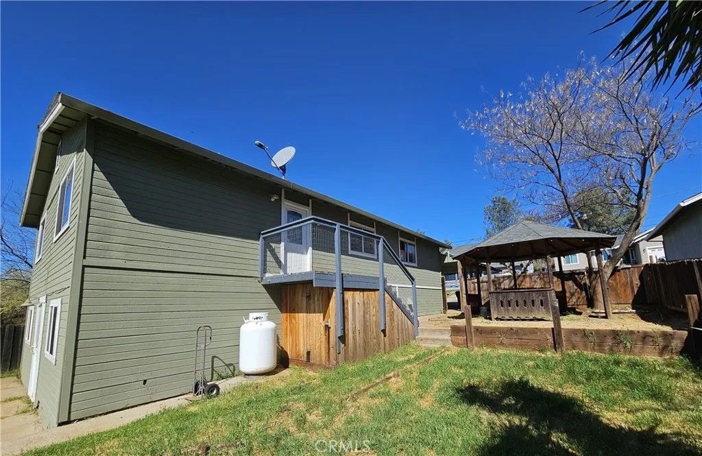 Photo of 19141 Ravenhill Rd, Hidden Valley Lake, CA 95467 (MLS # LC26077249)