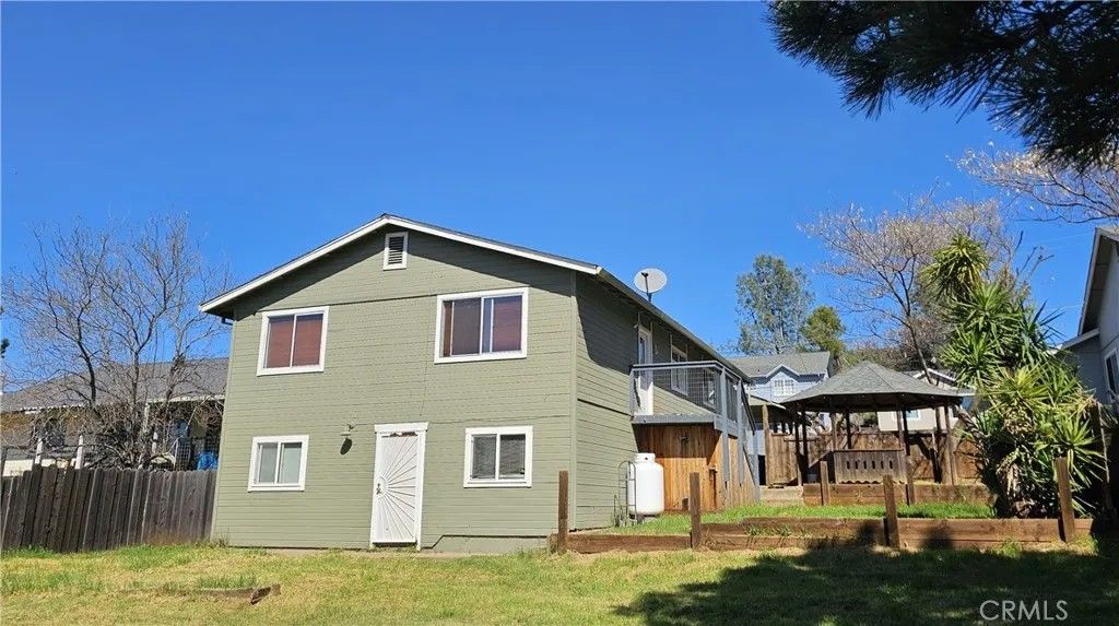 Photo of 19141 Ravenhill Rd, Hidden Valley Lake, CA 95467 (MLS # LC26077249)