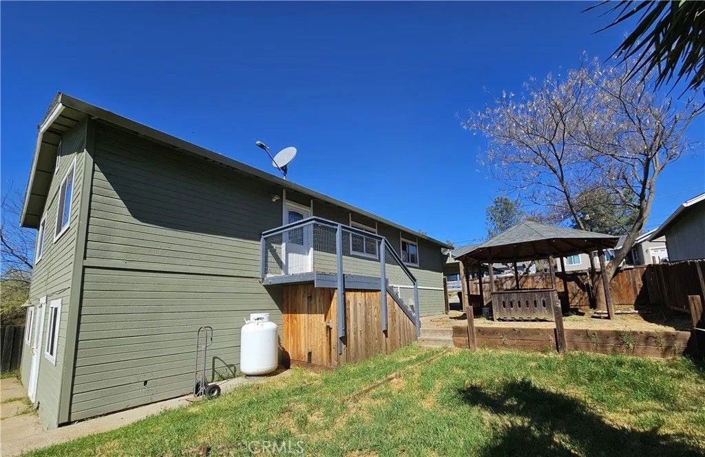 Photo of 19141 Ravenhill Rd, Hidden Valley Lake, CA 95467 (MLS # LC26077249)