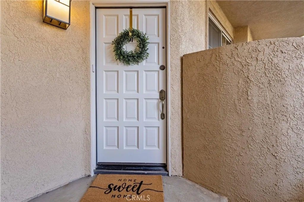 Photo of 23839 Del Monte Drive #91, Valencia, CA 91355 (MLS # SR25272090)