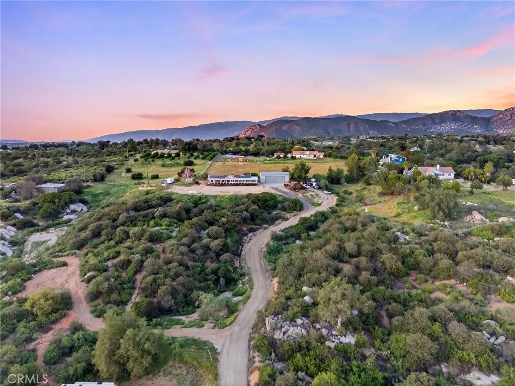 Photo of 26746 Calle De Encinas, Valley Center, CA 92082 (MLS # SW26060035)