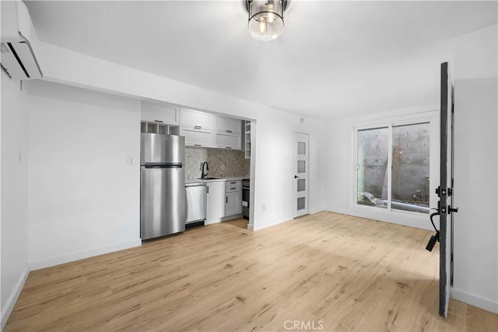 Photo of 1303 N Beverly Glen Boulevard, Los Angeles, CA 90077 (MLS # GD26072946)