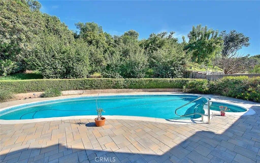 Photo of 22 Gunsmoke Ave, Phillips Ranch, CA 91766 (MLS # TR26047372)