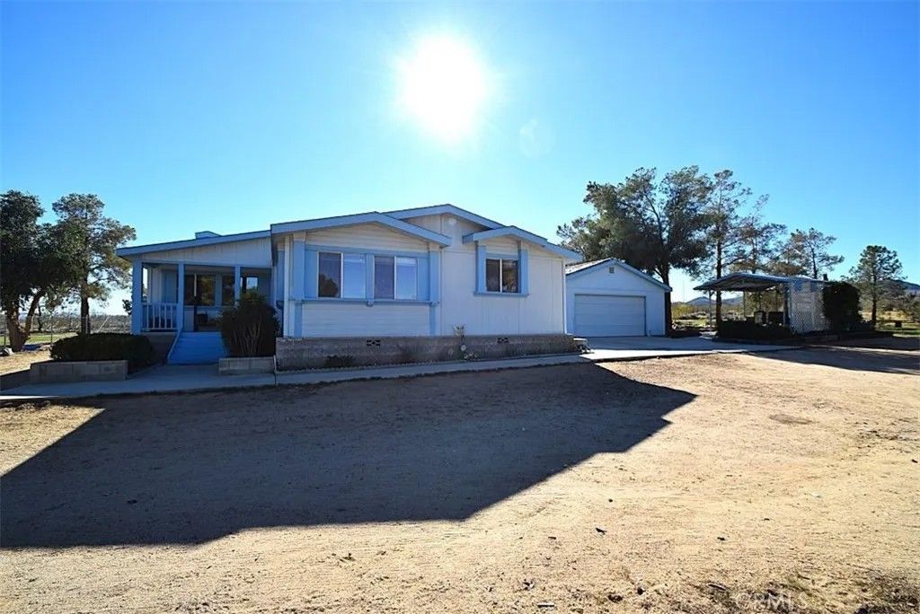 Photo of 56788 Encantado Rd, Landers, CA 92285 (MLS # JT25274639)