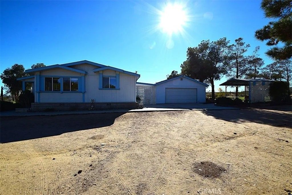 Photo of 56788 Encantado Rd, Landers, CA 92285 (MLS # JT25274639)