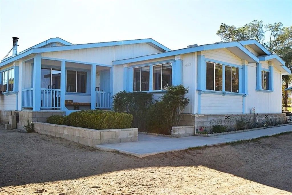 Photo of 56788 Encantado Rd, Landers, CA 92285 (MLS # JT25274639)